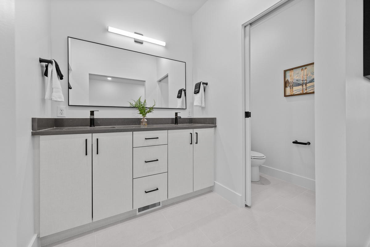 Spacious bathroom serving the upstairs bunk room.