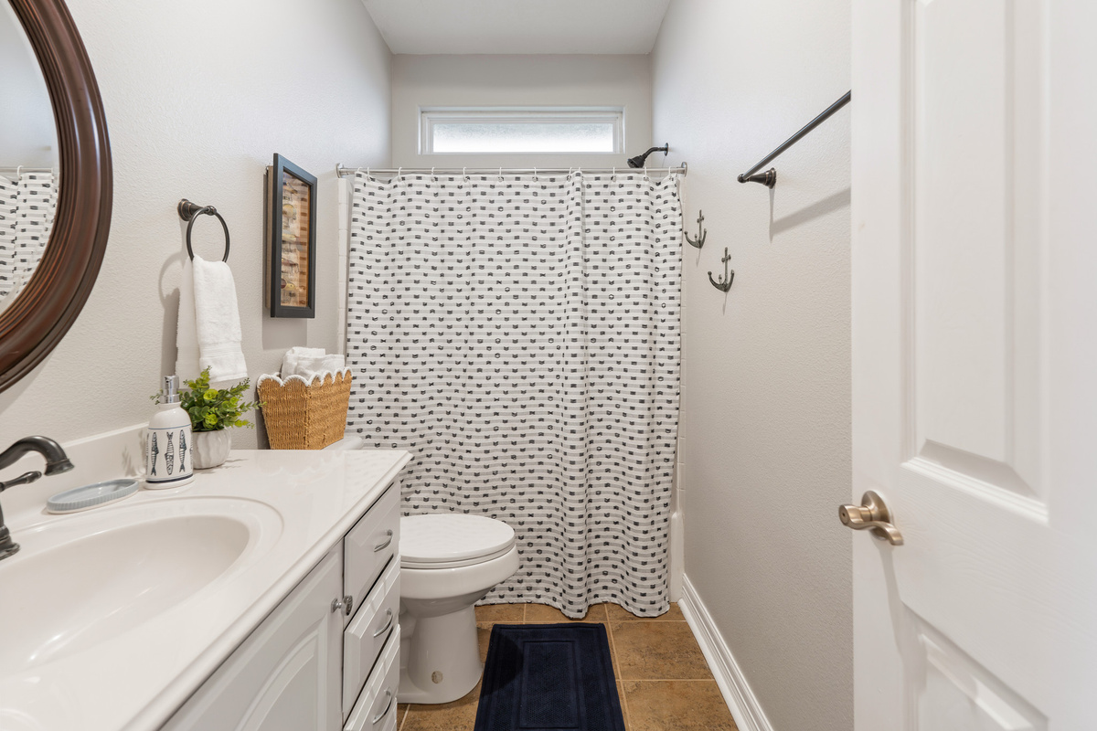 Hall bath on main level of home.