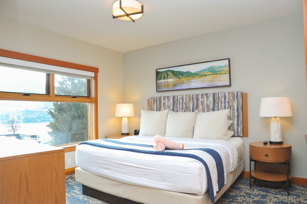Bedroom #1 of 3: King bed, TV, lake views, ensuite bathroom
