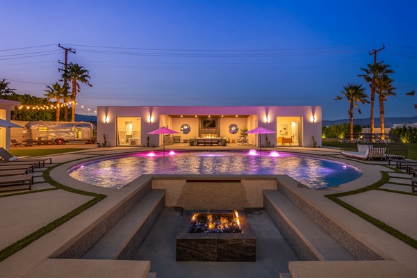 Backyard playground under the stars - with sunken fire pit, pool, guesthouse and vintage trailer