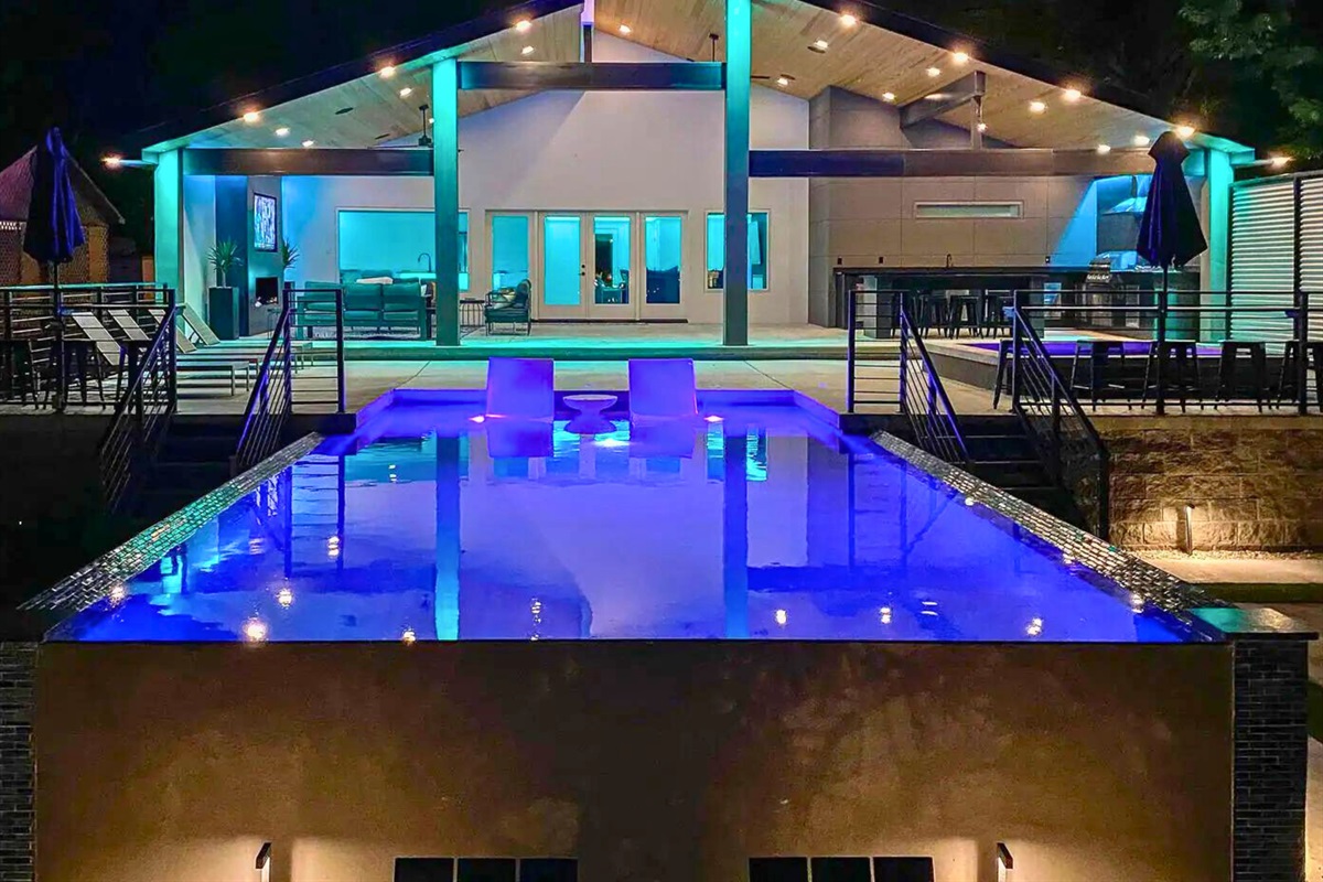 [Pool Area] Head Outside for a Fun Night Swim in the Heated Pool with the Neon Accent Lights!