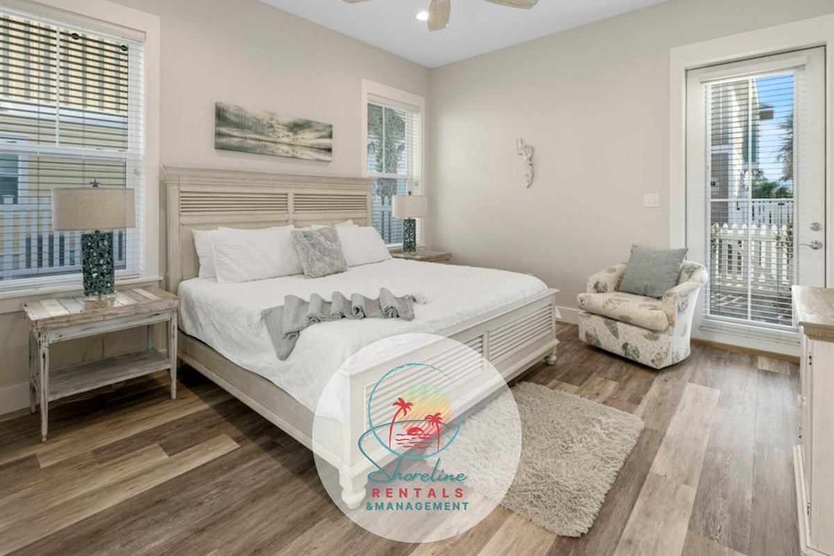 1st Floor Master Bedroom w/King bed, private bathroom and private access to back porch and pool!