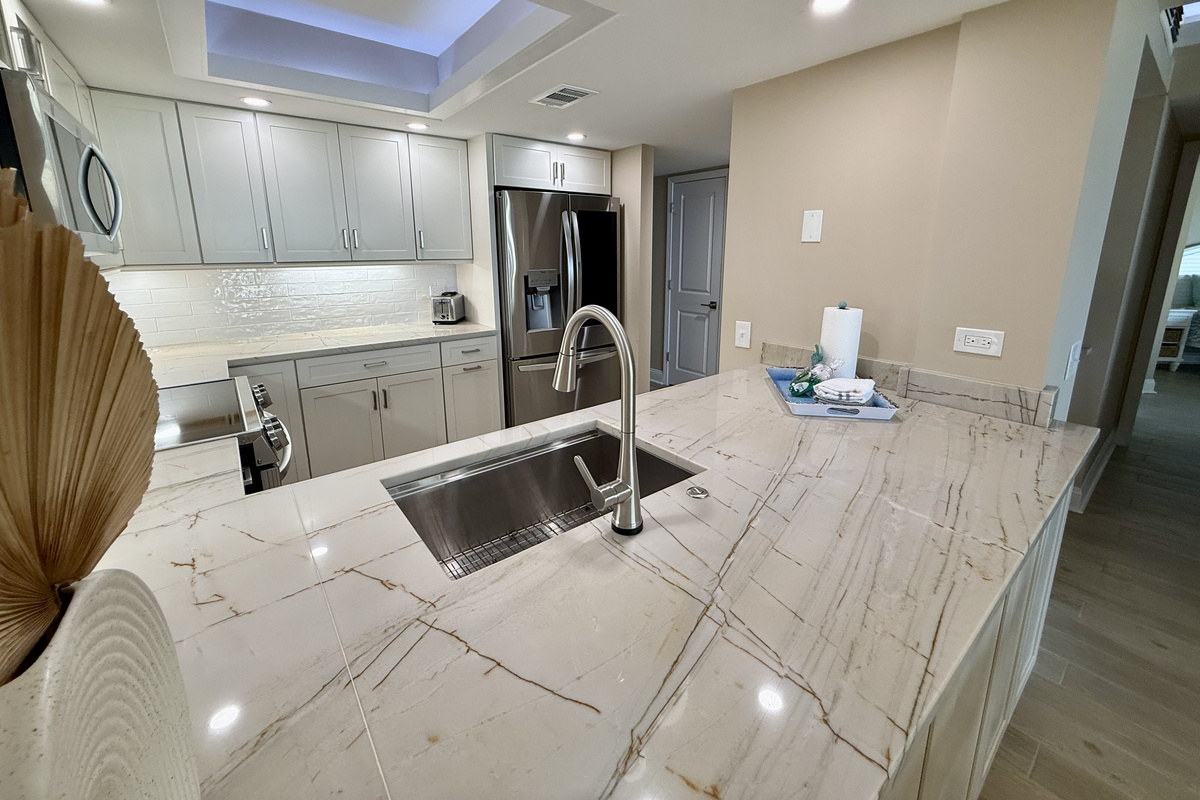 Remodeled Kitchen with New Cabinets, Countertops, Tray Ceiling and Stainless Appliances