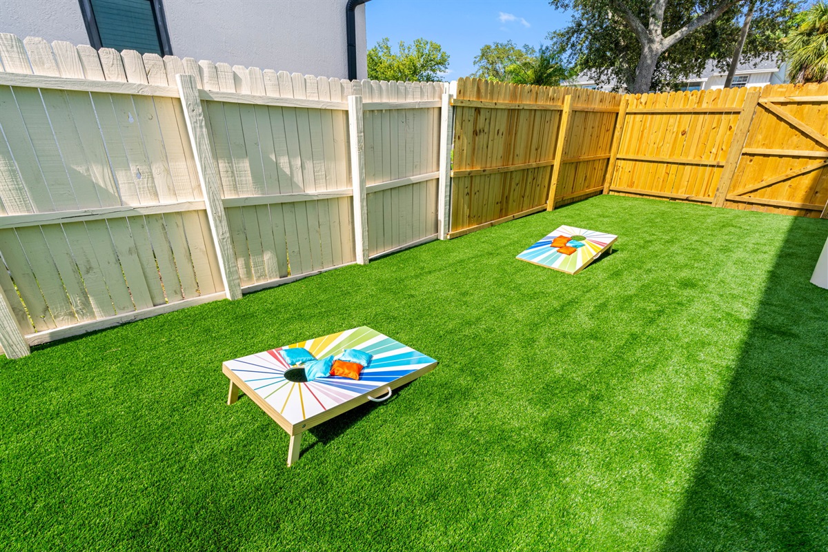 Challenge your group to a friendly match of cornhole or a putting contest on your very own mini golf course—fun for all ages right in the yard!