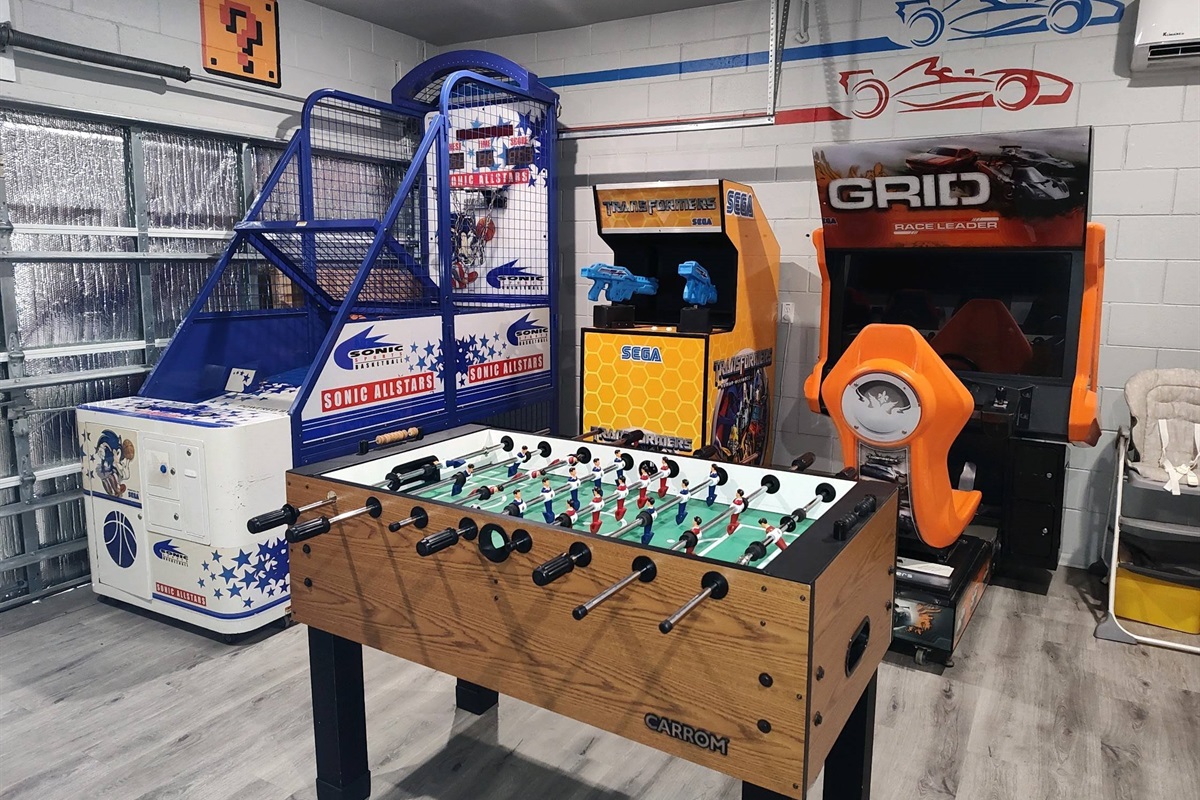 Replaced one of the racing game with transformer game