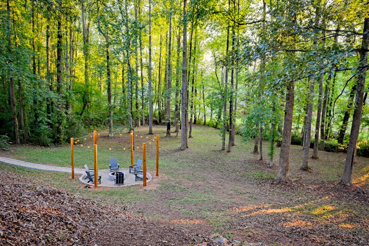 This backyard space is perfect for letting the kids roam and explore! Since this picture was taken, a soccer goal and ball has been added.