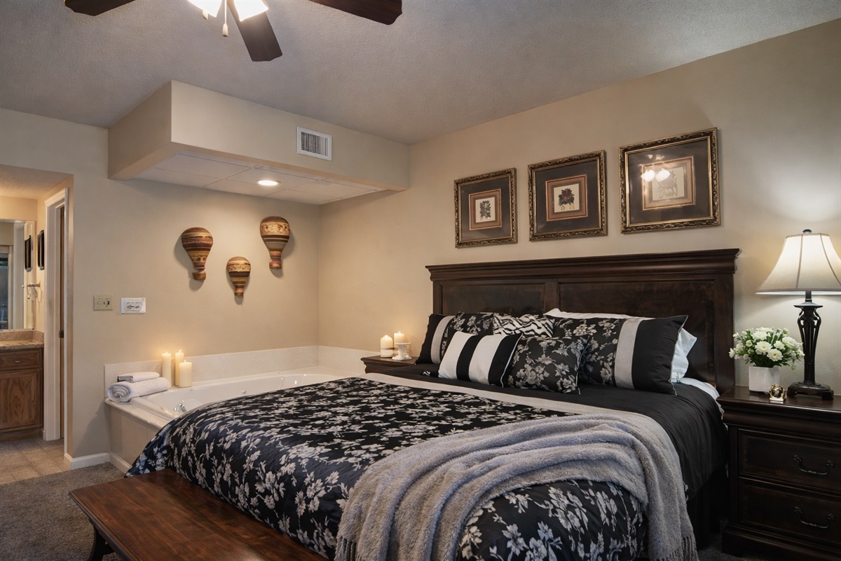 Spacious primary suite with jacuzzi tub.