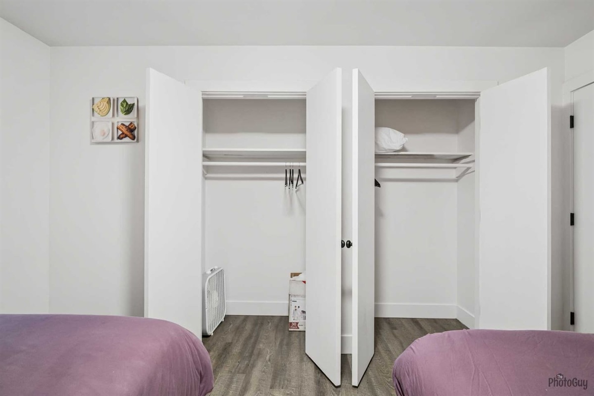 Double queen bedroom with closets