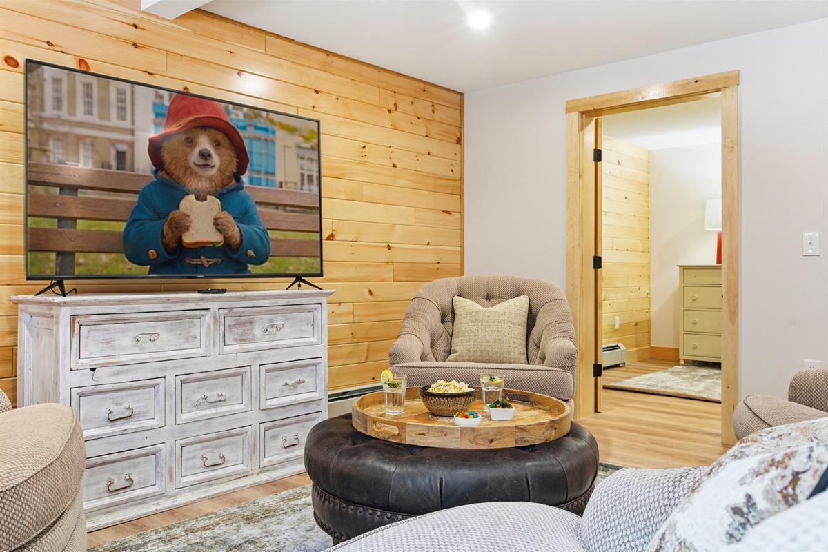 From rainy-day marathons to late-night gaming, our lower-level retreat is designed for relaxation and fun.