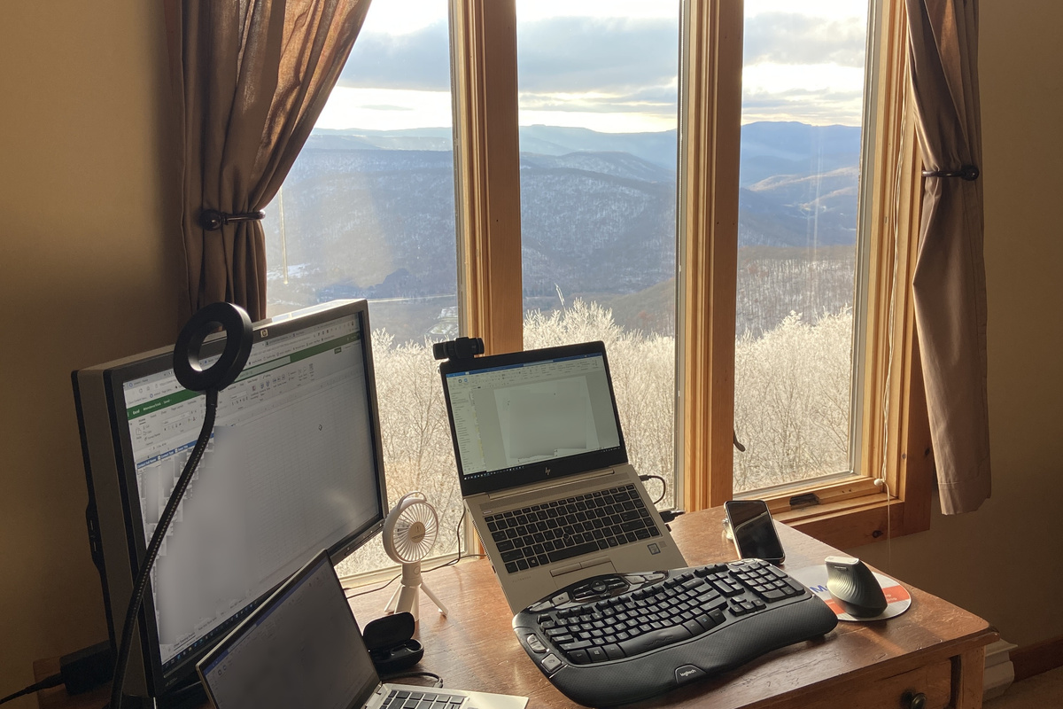 Telecommuting at its finest. We provide a monitor, printer, and scanner.