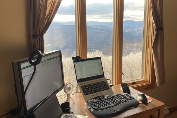 Telecommuting at its finest. We provide a monitor, printer, and scanner.