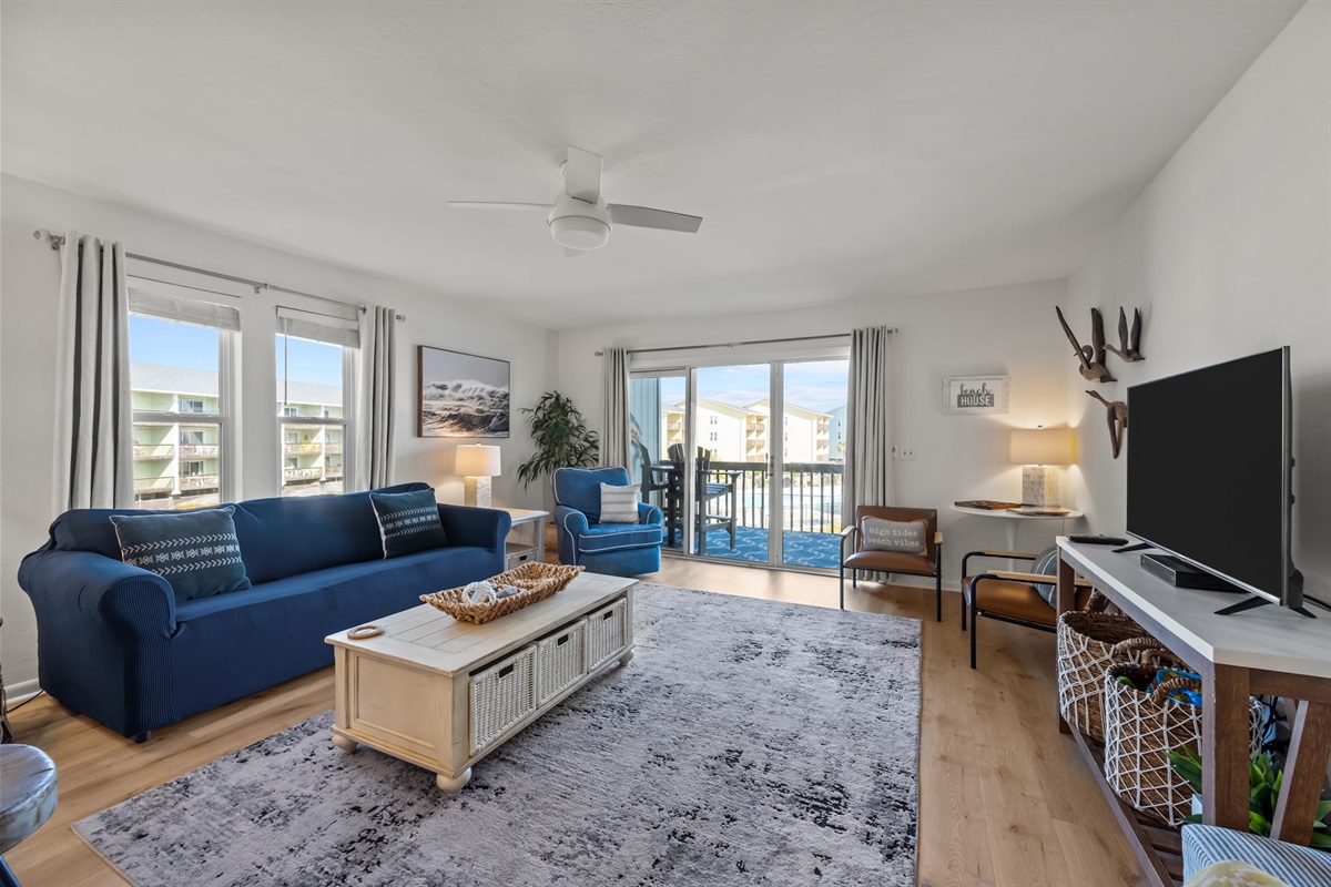 Spacious living room and balcony views.