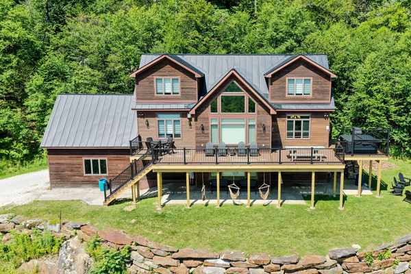 Large 3 level home with multilevel patio and deck, fire pit, hot tub, and amazing views