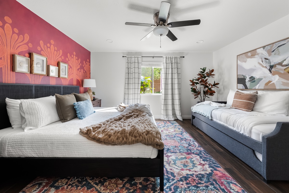 Primary Suite w/ king bed and twin trundle (two twins)