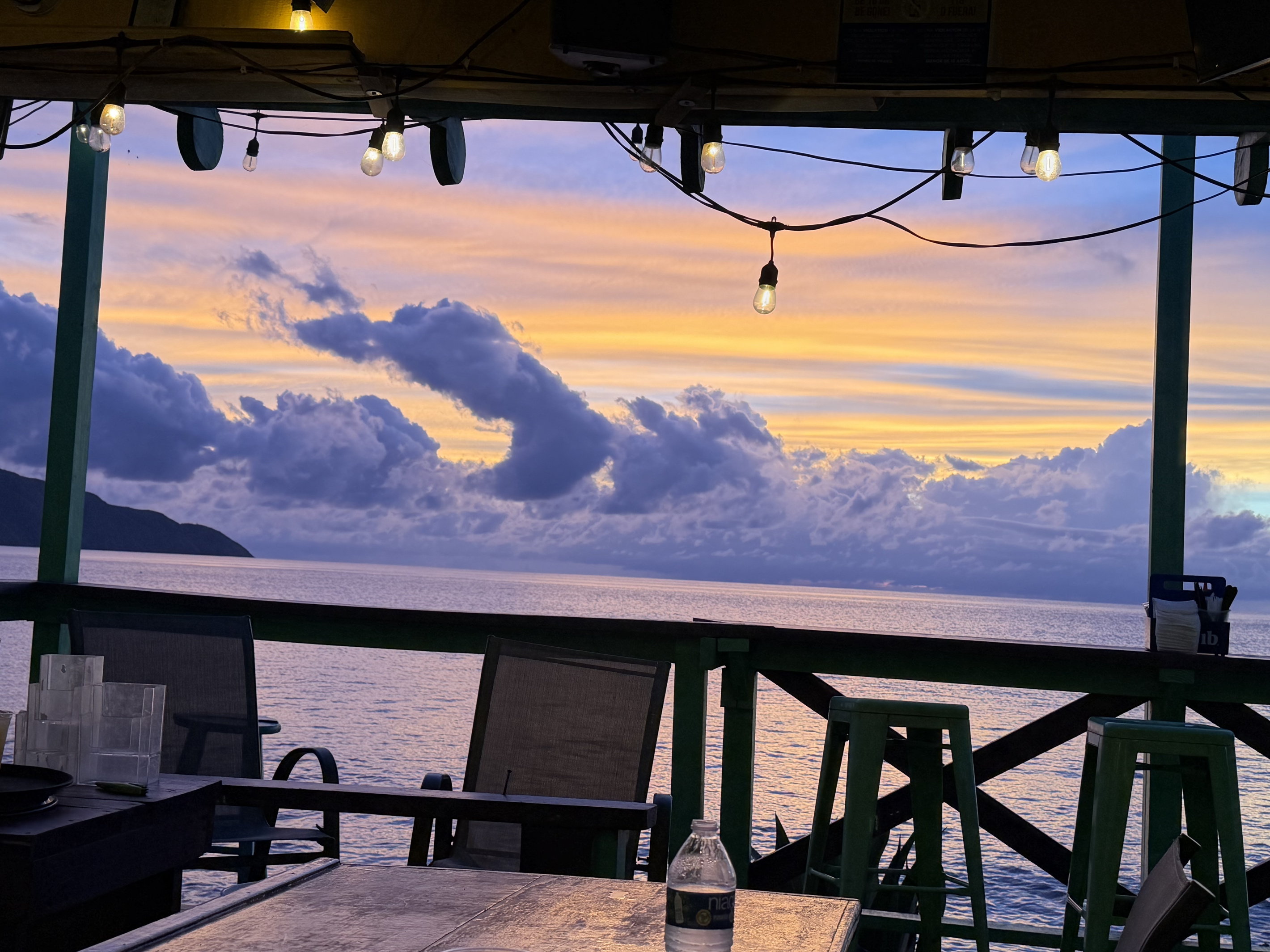 Off The Wall is a short walk or drive. A favorite of both locals and island visitors serving up consistently good bar food, a friendly bartender, and perhaps the best view on the island. 