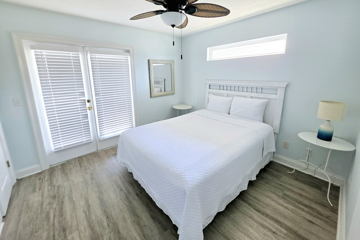 Bright bedroom with ceiling fan