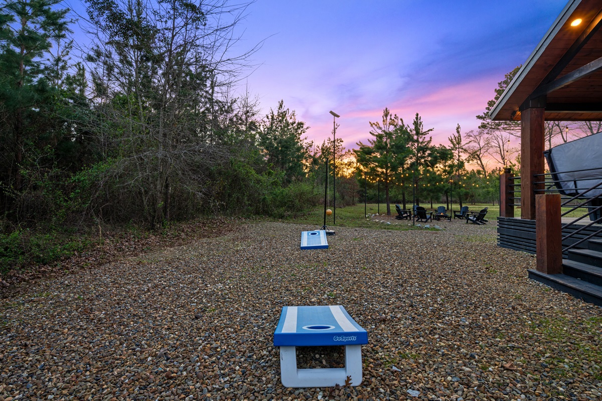 The yard offers plenty of open space for games, relaxing, or simply enjoying the peaceful natural surroundings.