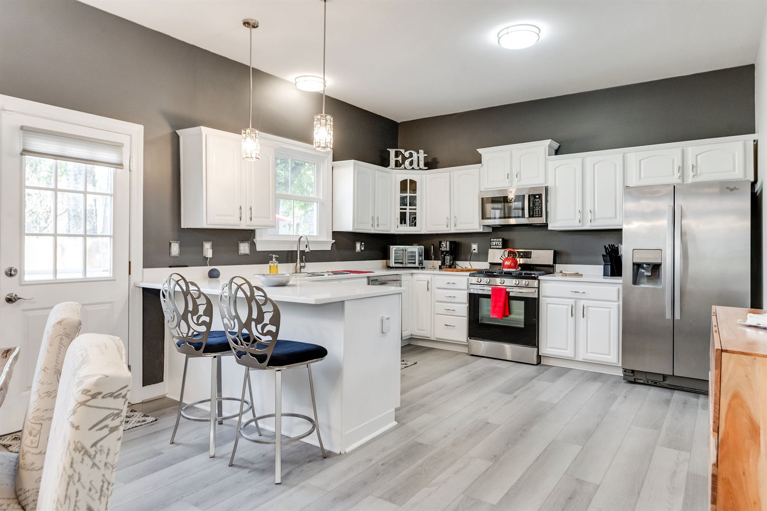 Modern Kitchen: Cook up a storm in this stylish space with sleek appliances and vibrant decor!