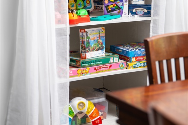 Hours of entertainment with shelves full of games, toys, and books!
