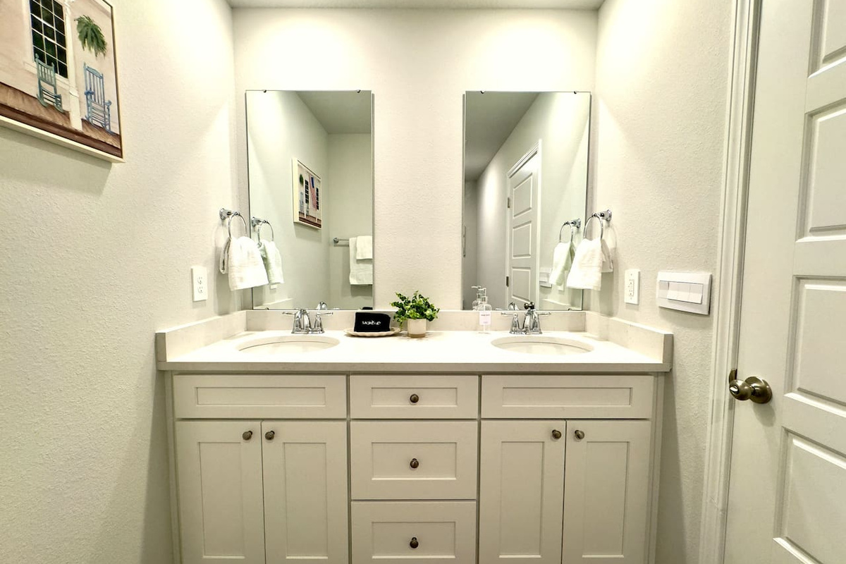 Bright mirror light waking you up. Clean, fresh space to get ready at your own pace.