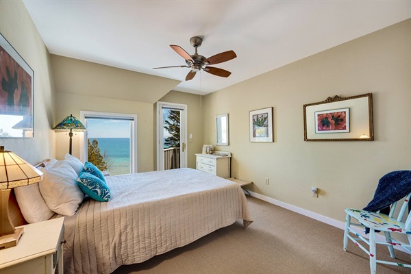 2nd upstairs bedroom:  Queen Casper mattress. Access to second story balcony. Gorgeous views of lake to wake up to!
