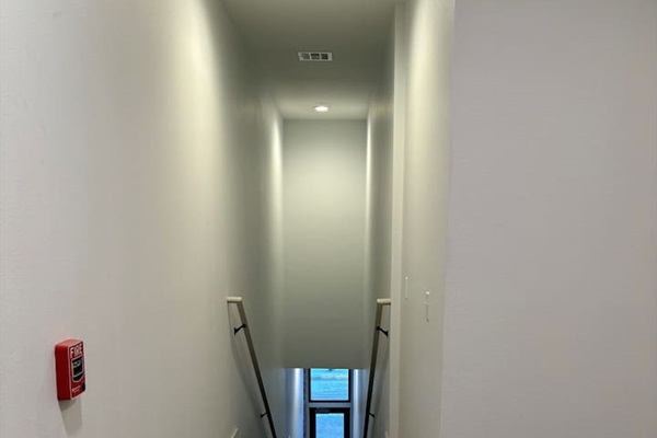 This is the view looking down from atop of the stairs to the Main Street entrance.  We do have approximately 20 stairs to climb that offers a landing in the middle to break up the accent!