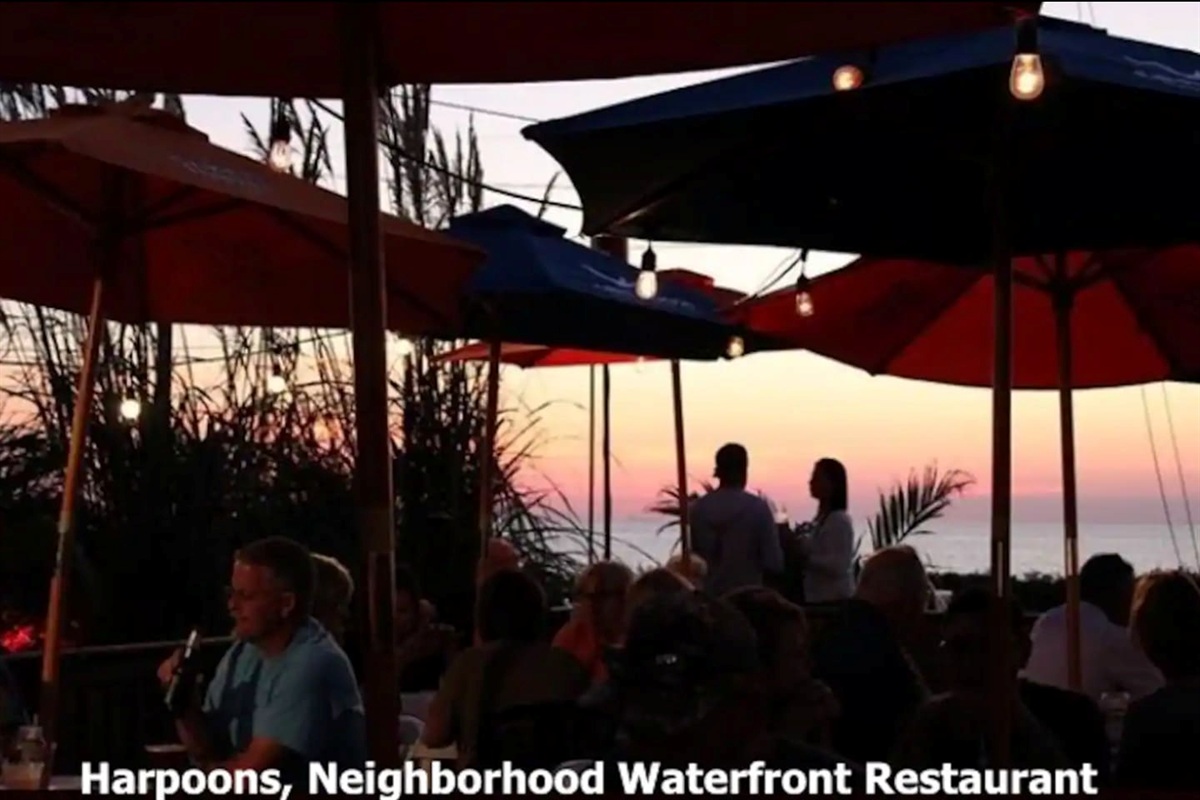 Savor dinner with a view at Harpoons, a popular neighborhood waterfront restaurant. Relax under the glow of string lights and umbrellas while watching a spectacular sunset over the water at this local favorite.
