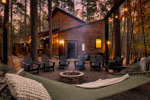 Chocolate Fudge cabin exterior among the pines