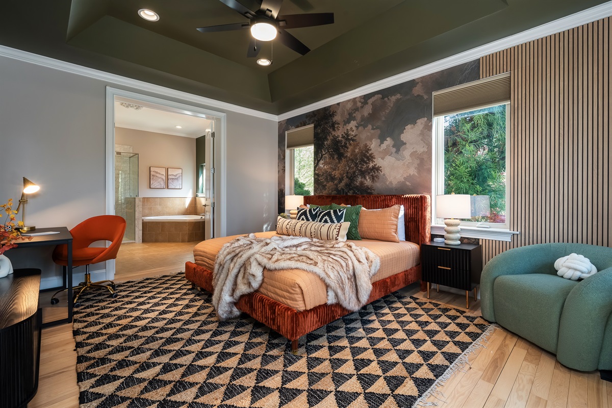 Open bedroom layout with en suite connection - adds convenience for couples and primary guests