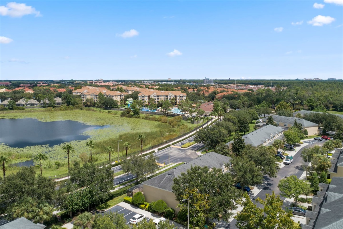 Scenic aerial view of lake and surrounding community.

