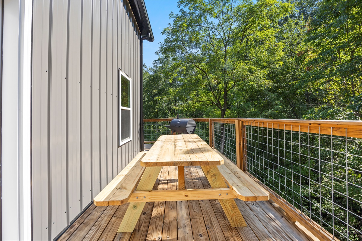 Picnic table on the deck — a great spot for outdoor meals or morning coffee.