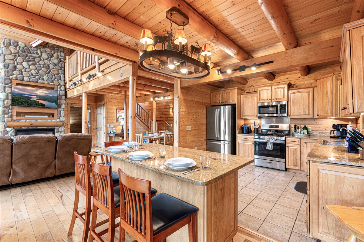 Main Level Dining Room: Gather around for memorable meals in this charming, wood-beamed sanctuary!
