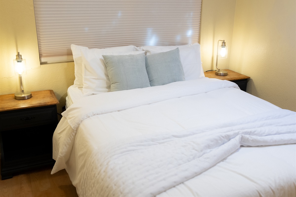 Sink into crisp, white linens and enjoy a restful night’s sleep.