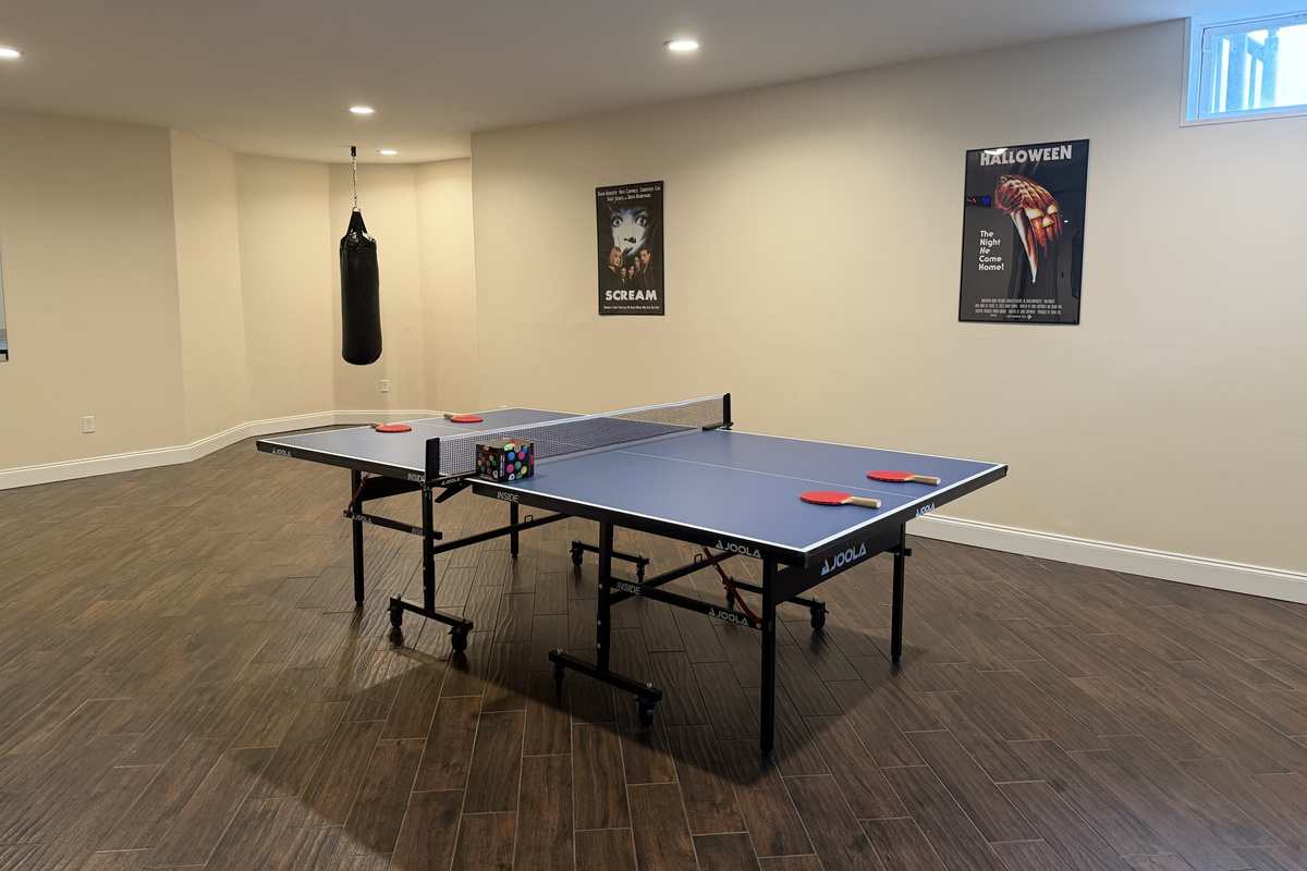 Ping pong table in lower level. 
