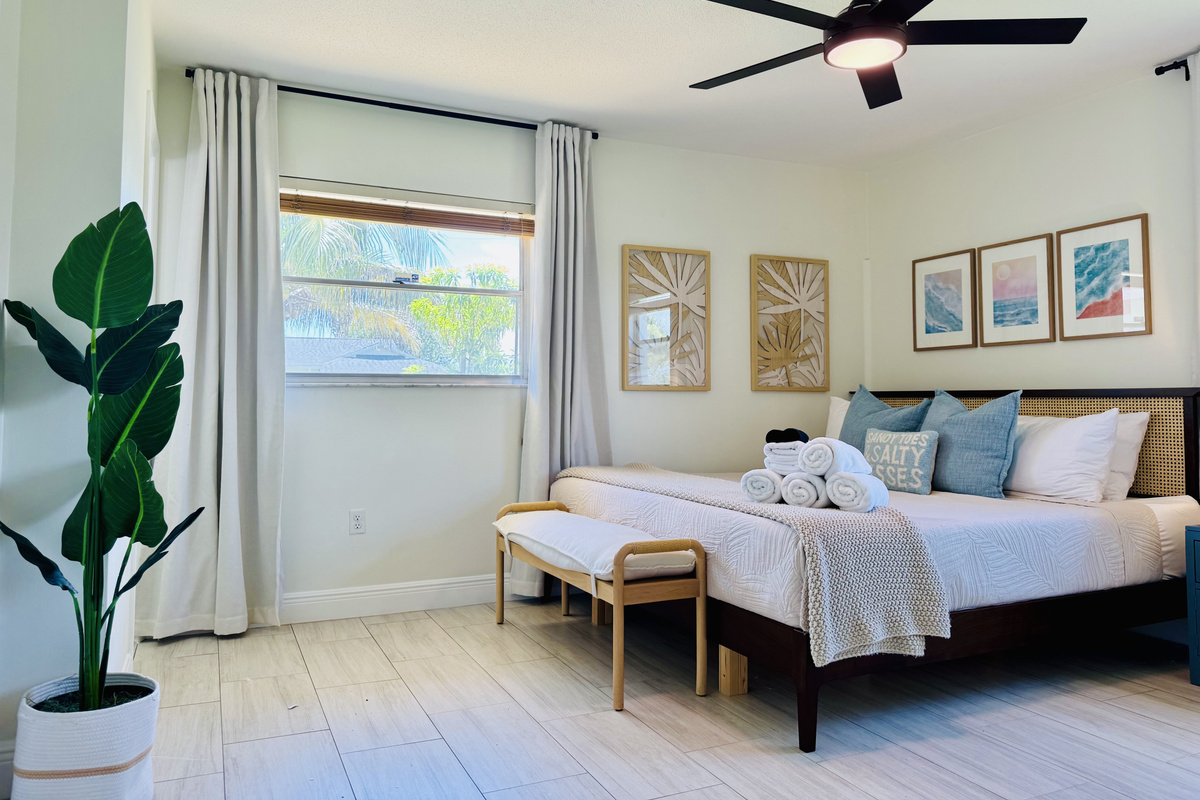 A cozy haven awaits in the third bedroom—rest easy on the king-size bed and wake up refreshed for the day ahead.