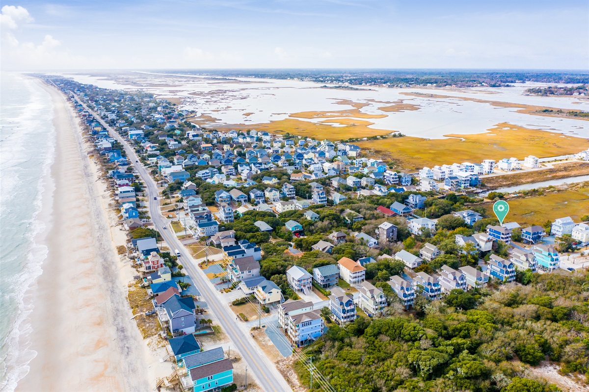 Aerial perspective of sun-kissed sands and sparkling Intracoastal Waterway waters. Are you ready to book your stay yet??
