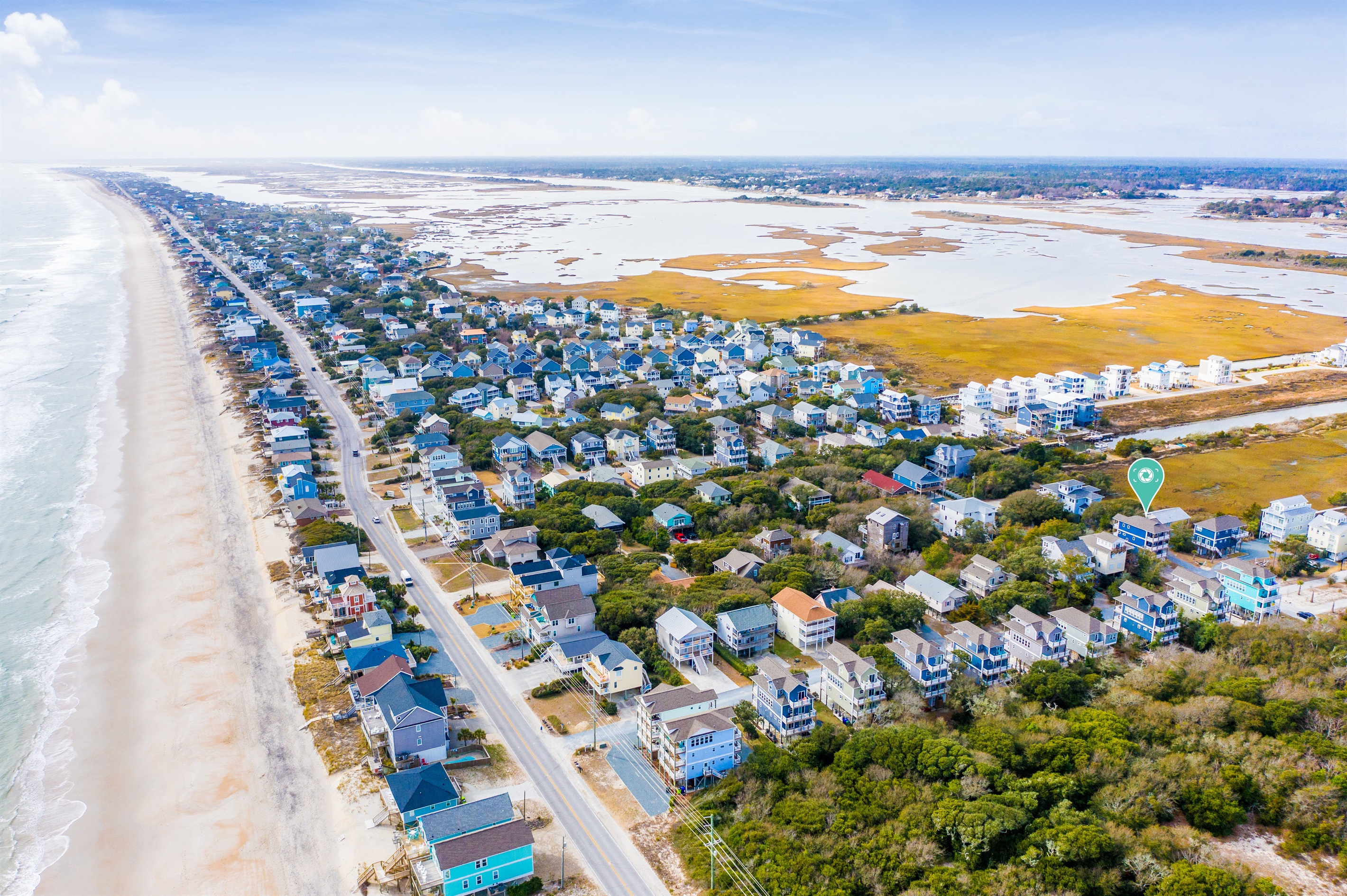 Aerial perspective of sun-kissed sands and sparkling Intracoastal Waterway waters. Are you ready to book your stay yet??