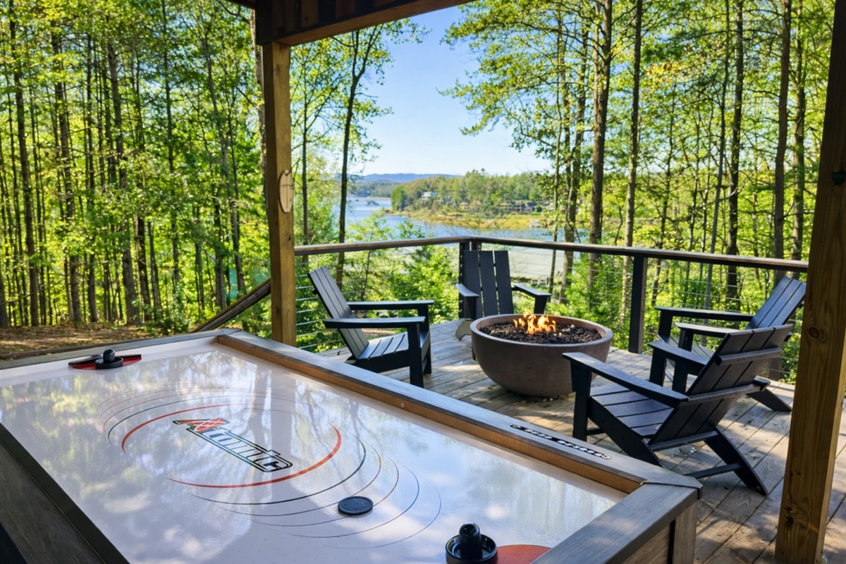 Challenge your friends to air hockey on the deck, surrounded by the serene beauty of the trees and lake.