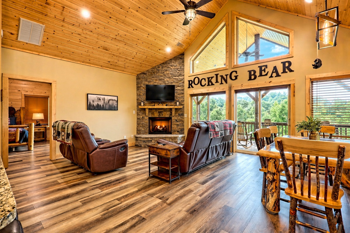 Where mountain charm meets modern comfort—soak in sweeping views, unwind by the stone fireplace, and gather in a space designed for unforgettable moments.