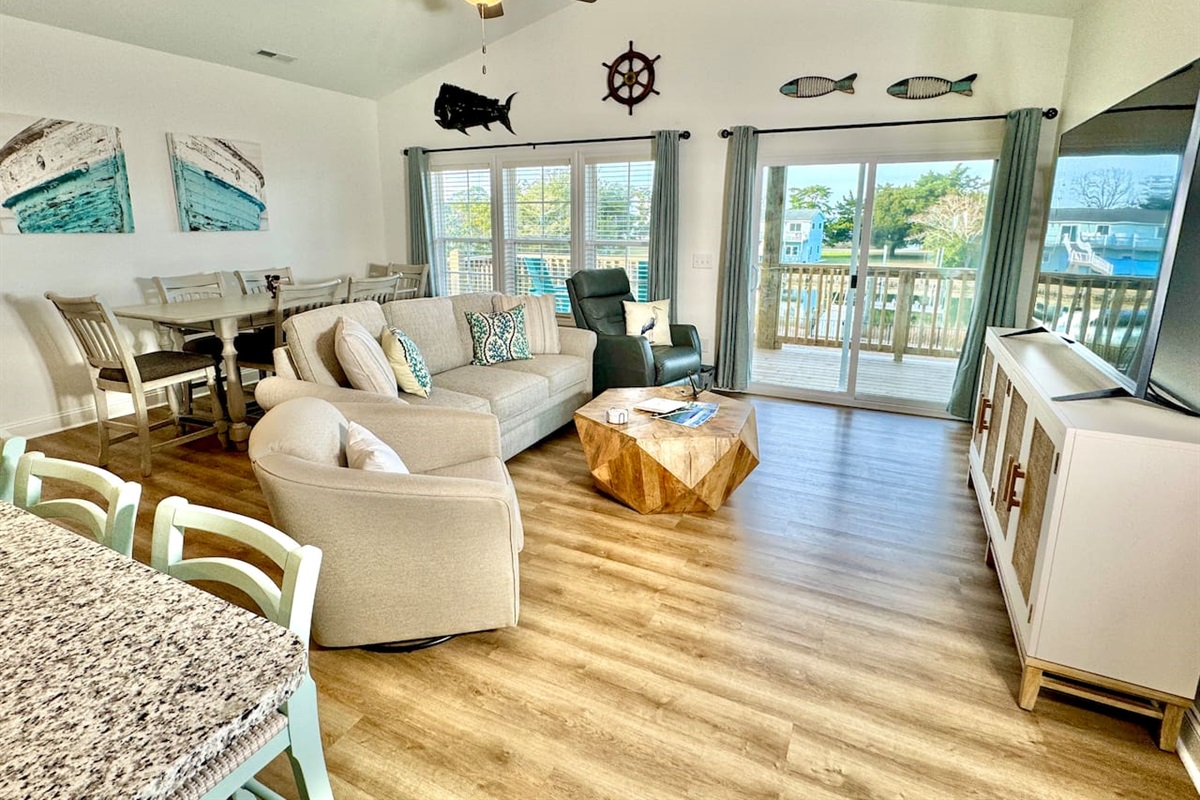 Get cozy while you relax in this living room with a water view. Sofa bed features a Queen mattress. 