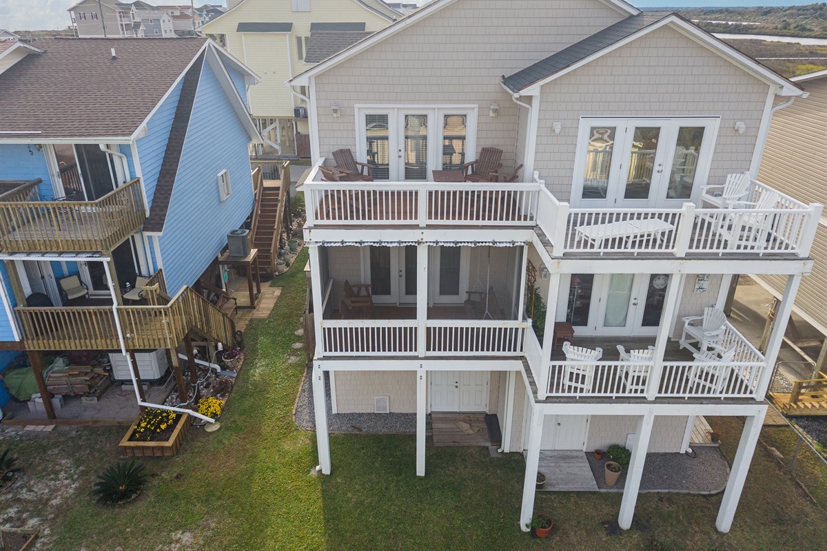 Enjoy outdoor living with several private deck spaces in the back and the front