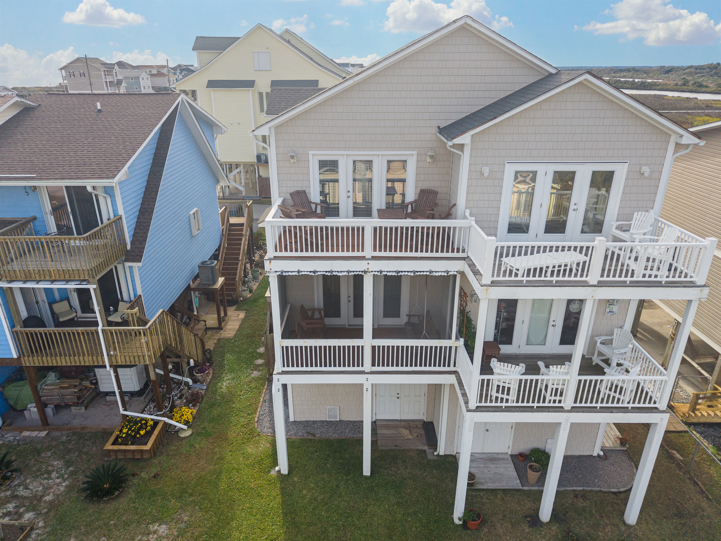 Enjoy outdoor living with several private deck spaces in the back and the front