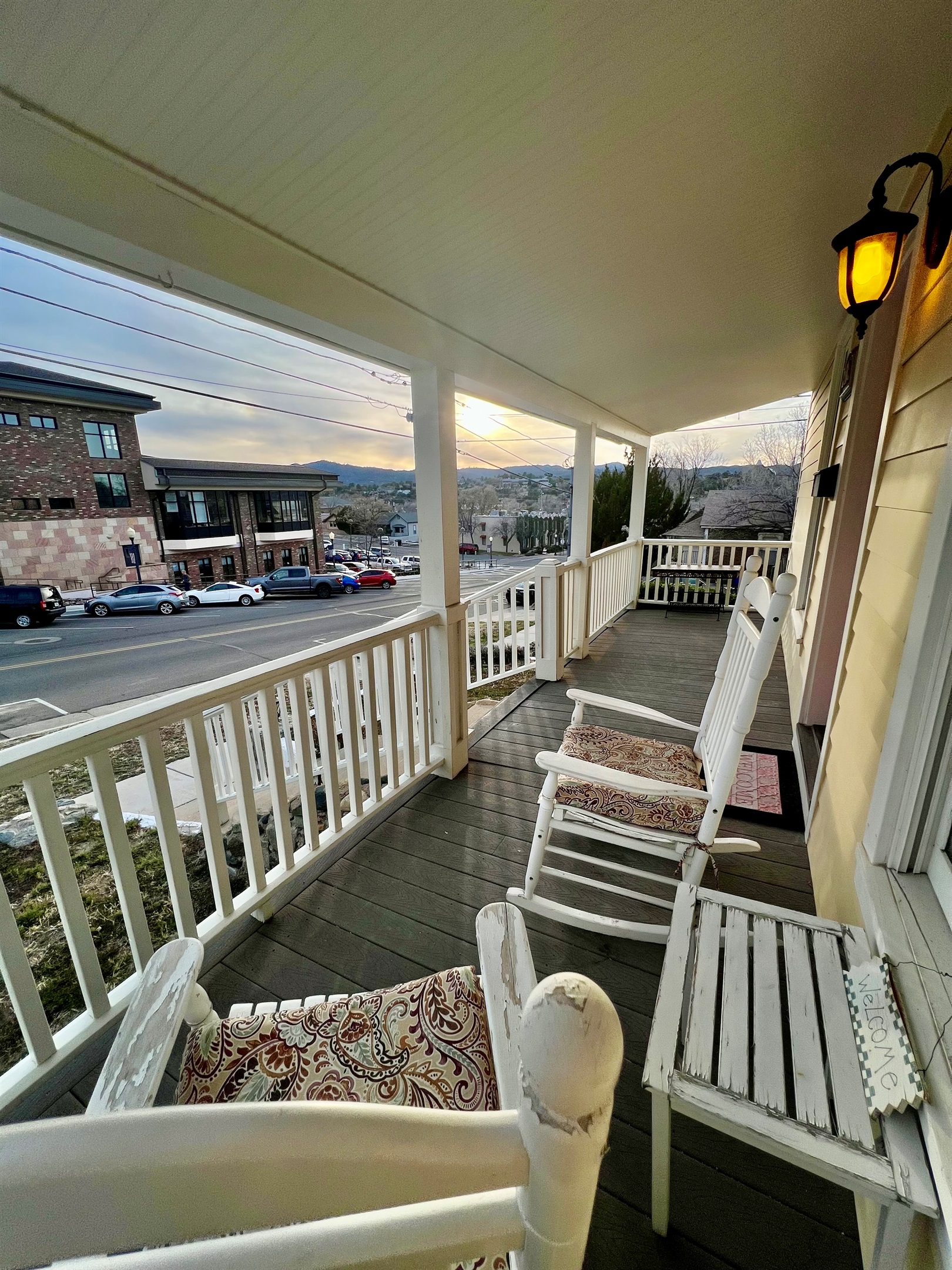 Sip, sit, and stay a while. Whether it’s a clear evening or a summer monsoon, this covered porch is the perfect spot for the evening glow.