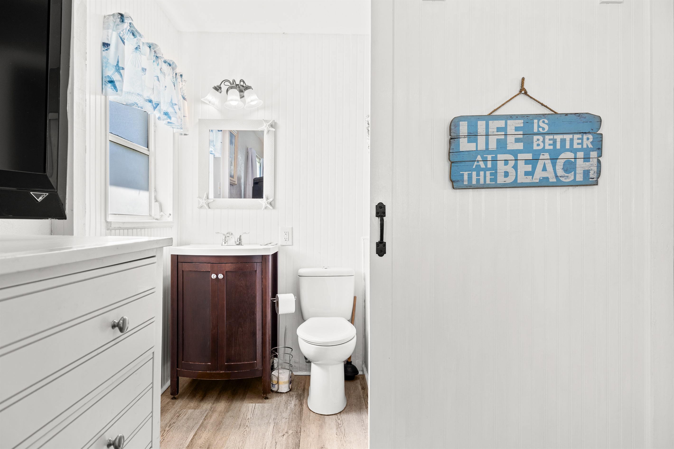 Master bath with shampoo, conditioner, body wash and hair dryer