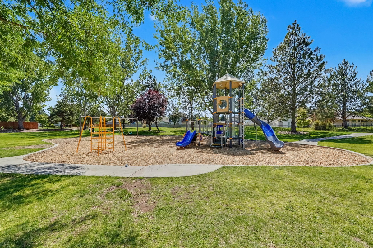 A spacious playground is conveniently located at the front of the neighborhood, providing a fun and welcoming place for kids to play, explore, and enjoy outdoor adventures.