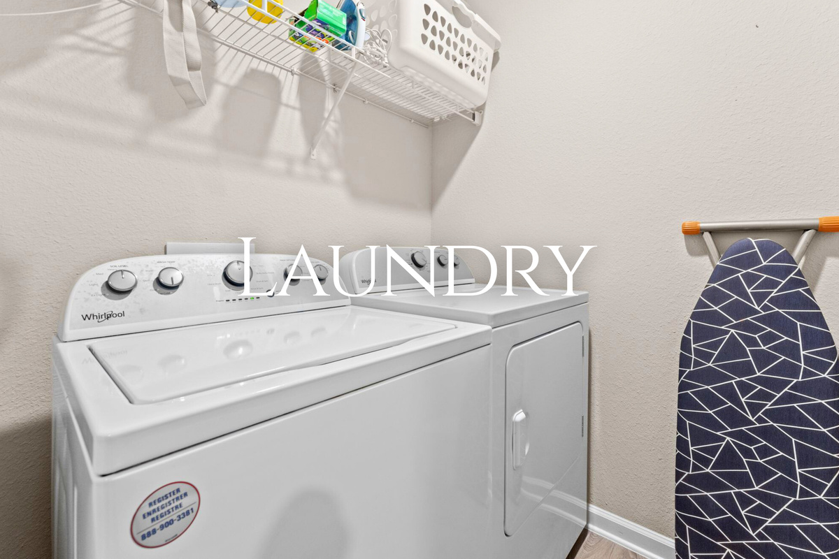 The laundry area adds everyday convenience, especially after beach days, outdoor adventures, or longer stays.