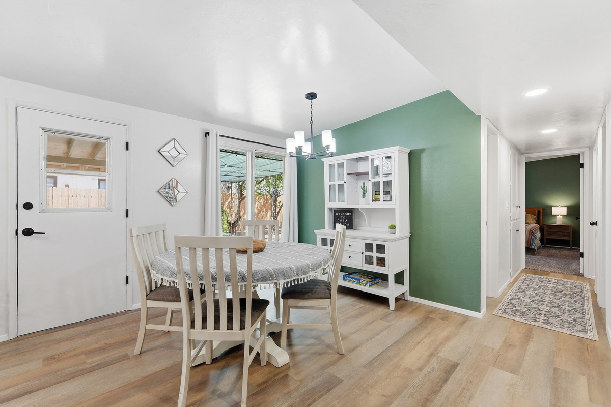 Morning Coffee Spot: Sunlit dining space located just steps from the kitchen for easy serving.