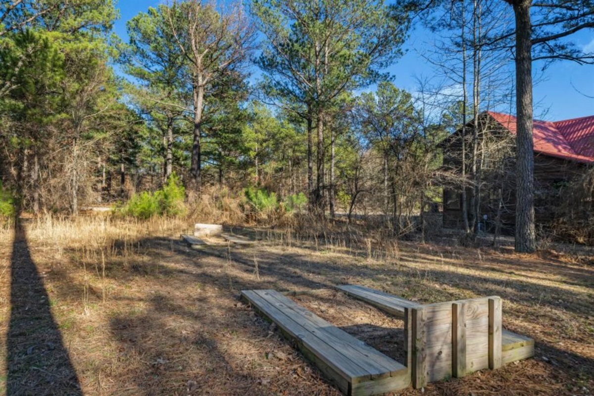 Enjoy a classic game of horseshoes under the pines—laid-back fun for all ages in the heart of Broken Bow.