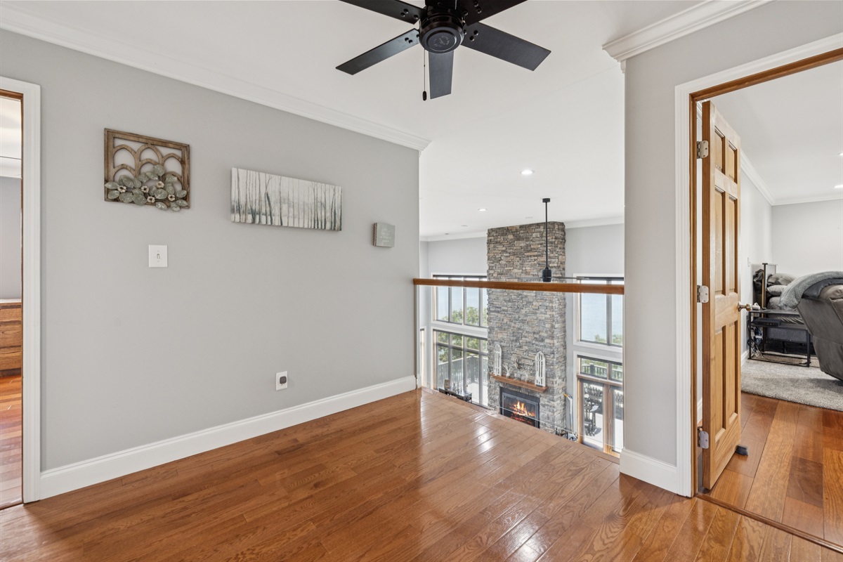 Upstairs hallway with a view down to the living room