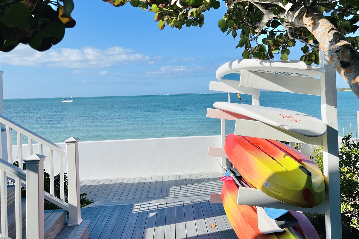 STARFISH BAY - Two kayaks and two paddle boards are stored on the lower deck with easy access into Sea of Abaco. An outdoor shower is also located on this lower deck.  (Another two Paddle Boards are located on Mermaid Cove lower deck)